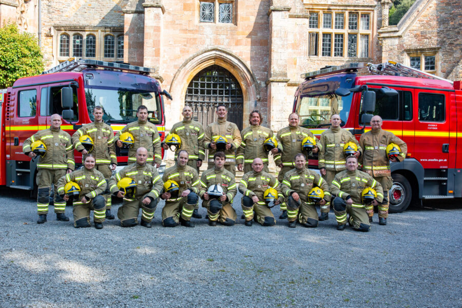 Firefighters from Clevedon Fire Station in front of two fire engines.